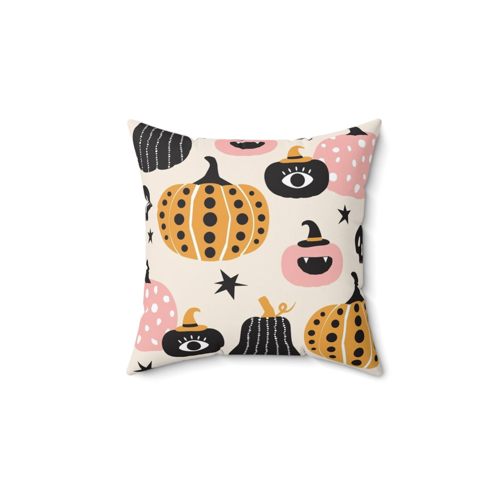 Decorative pillow with Halloween-themed pumpkins and ghosts on a white background