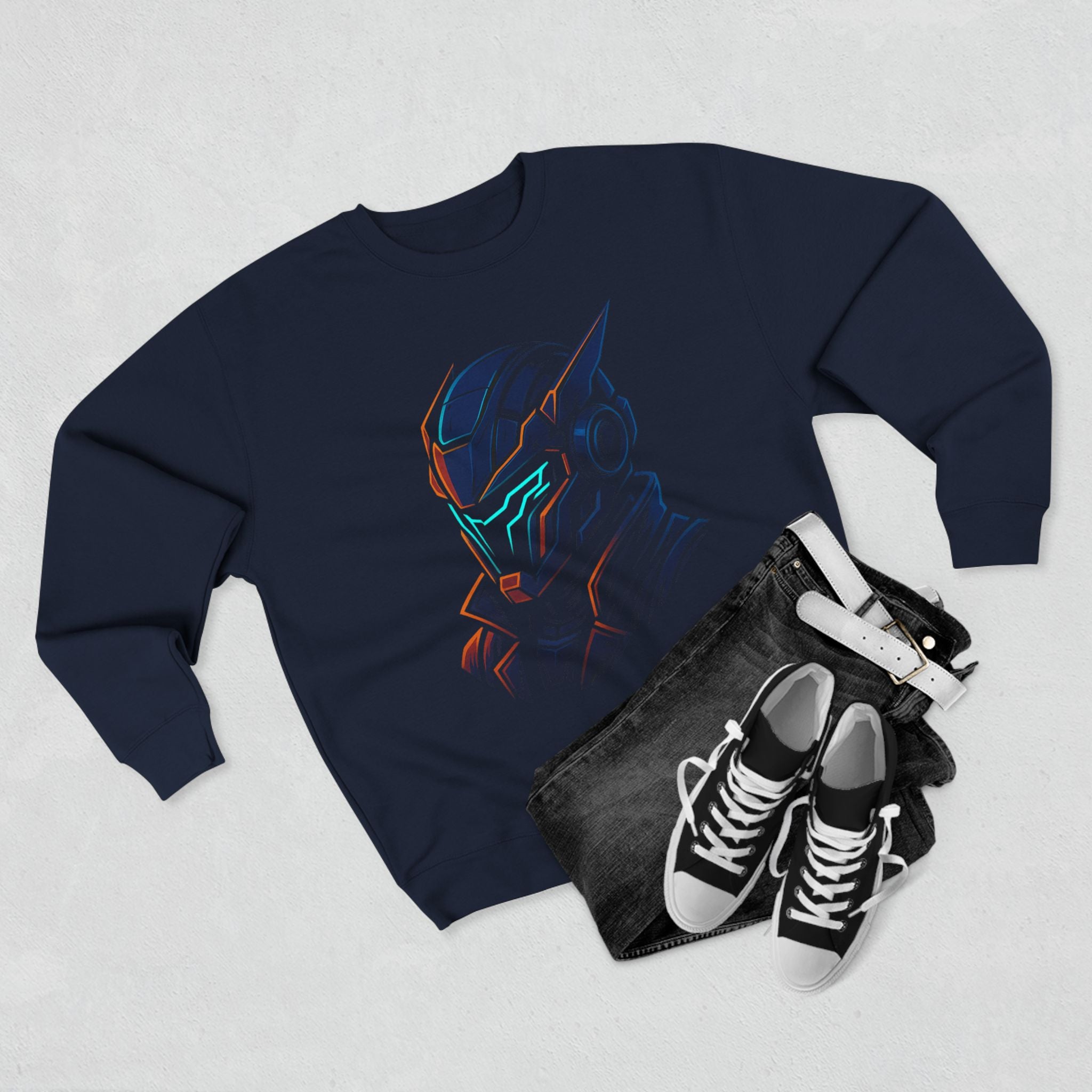 Navy sweatshirt with a colorful graphic, black pouch, and black sneakers on a light gray background