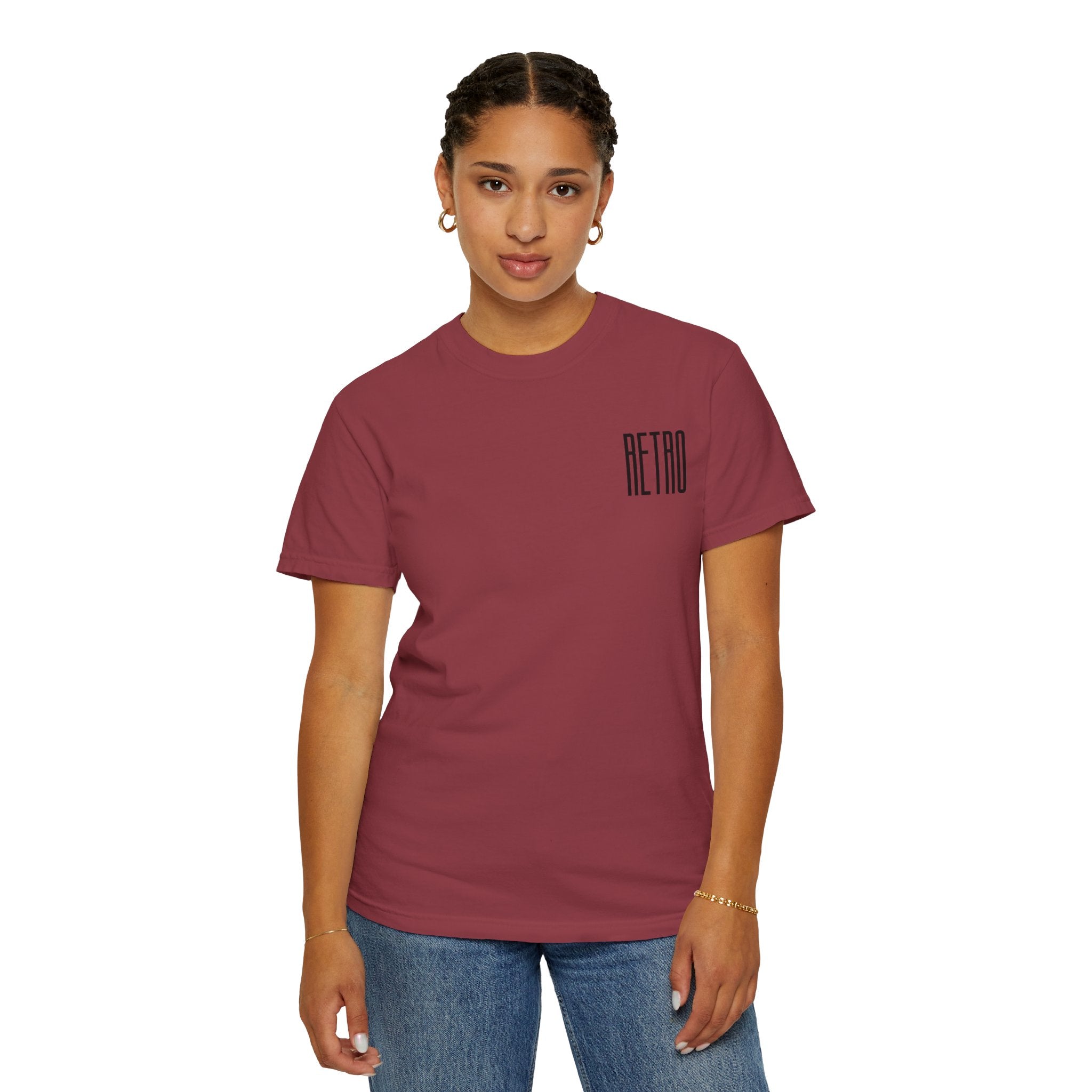 Person wearing a maroon t-shirt with 'RETRO' text on a white background
