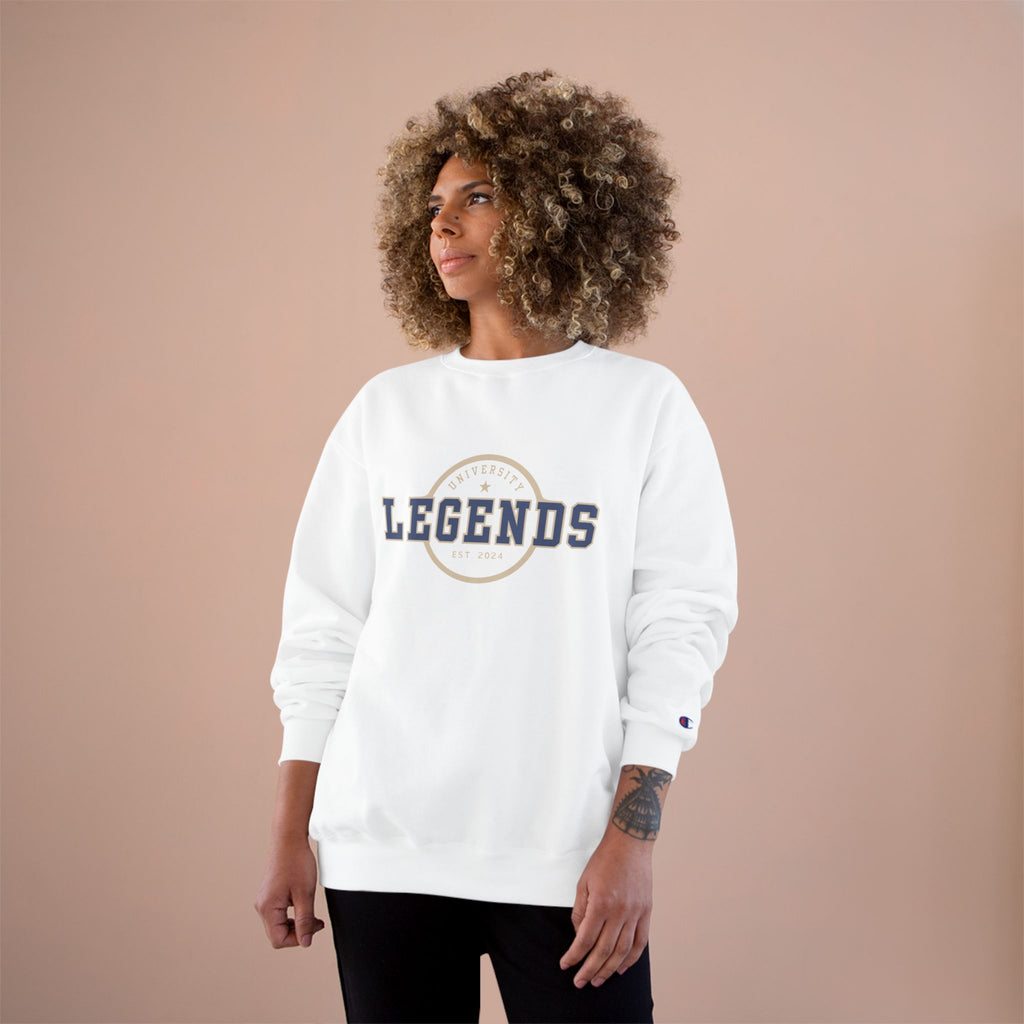 Person wearing a white sweatshirt with 'LEGENDS' print on a beige background