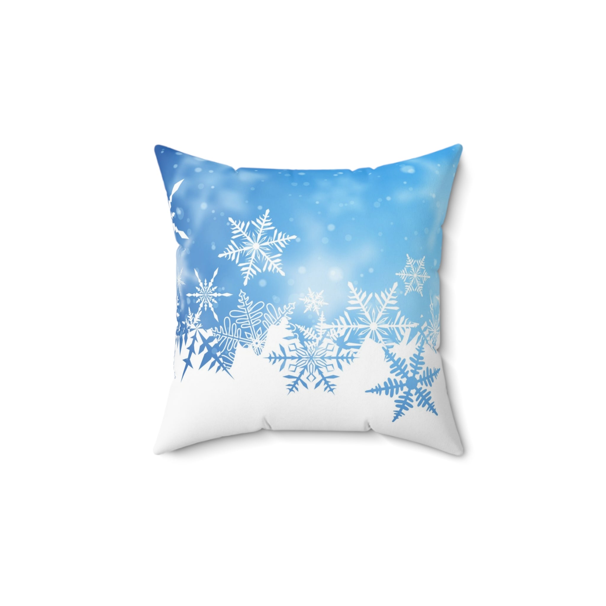 Decorative pillow with snowflake pattern on a blue and white background