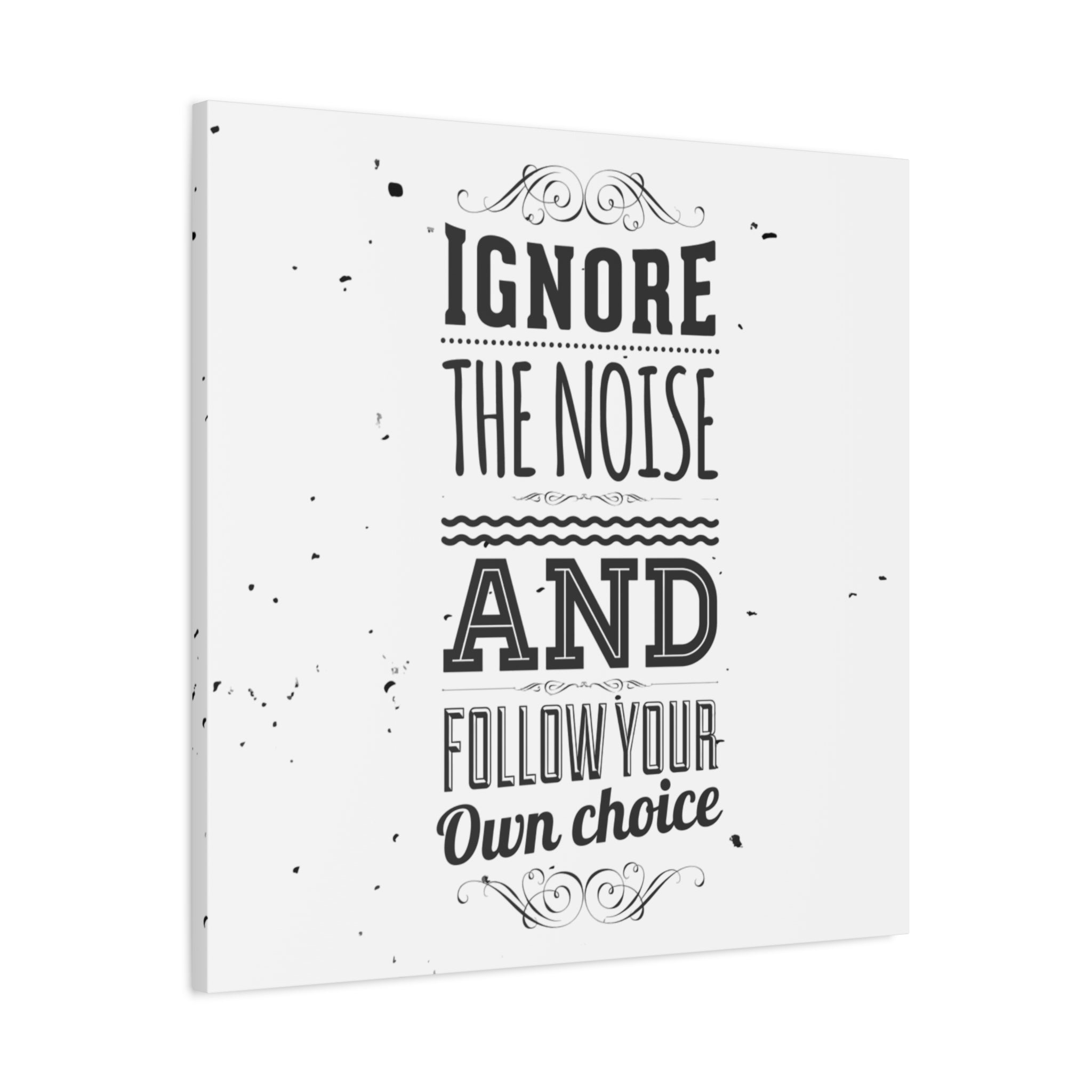 Canvas print with motivational quote 'Ignore the noise and follow your own choice' on a white background