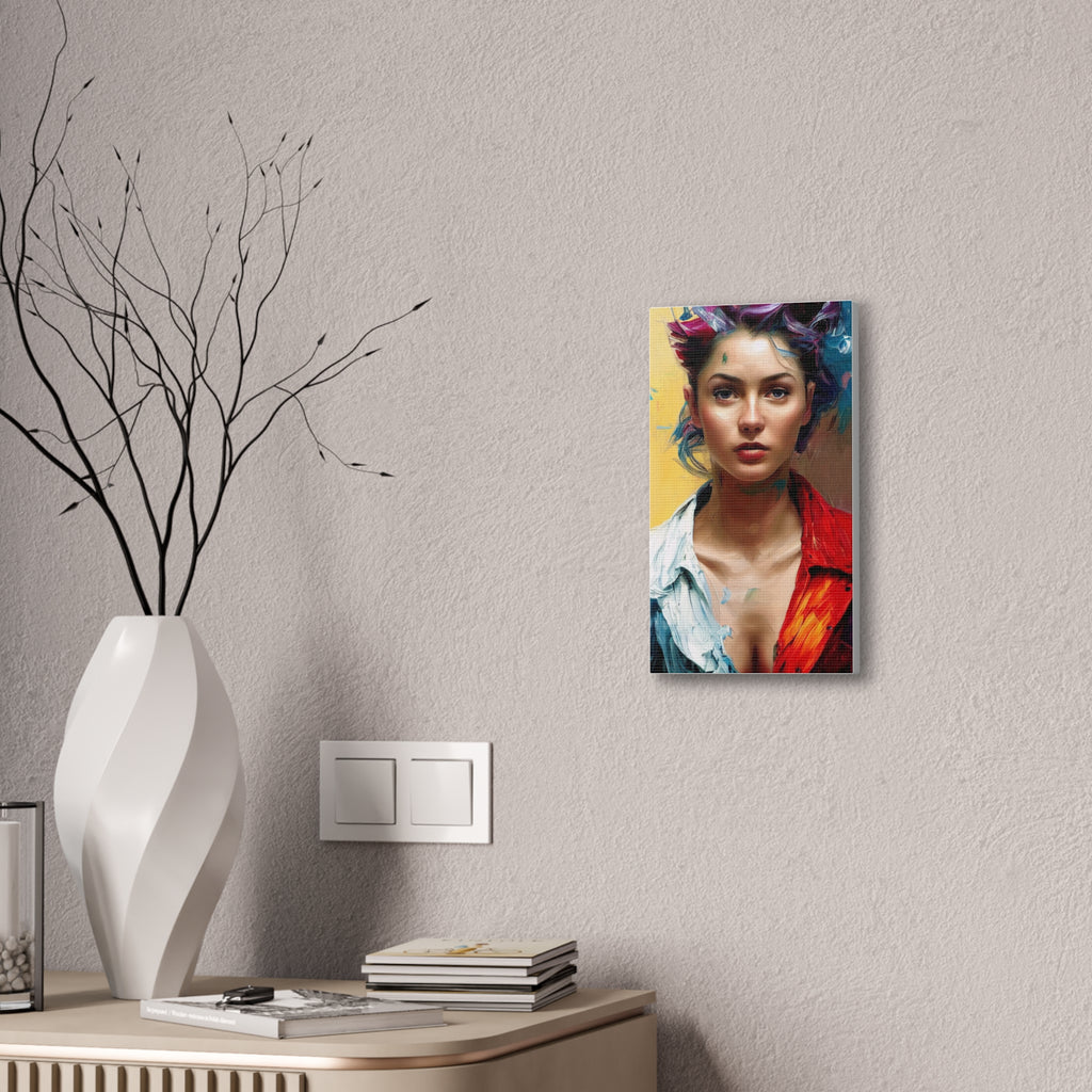 Canvas print of a colorful portrait on a wall next to a vase with branches and books.