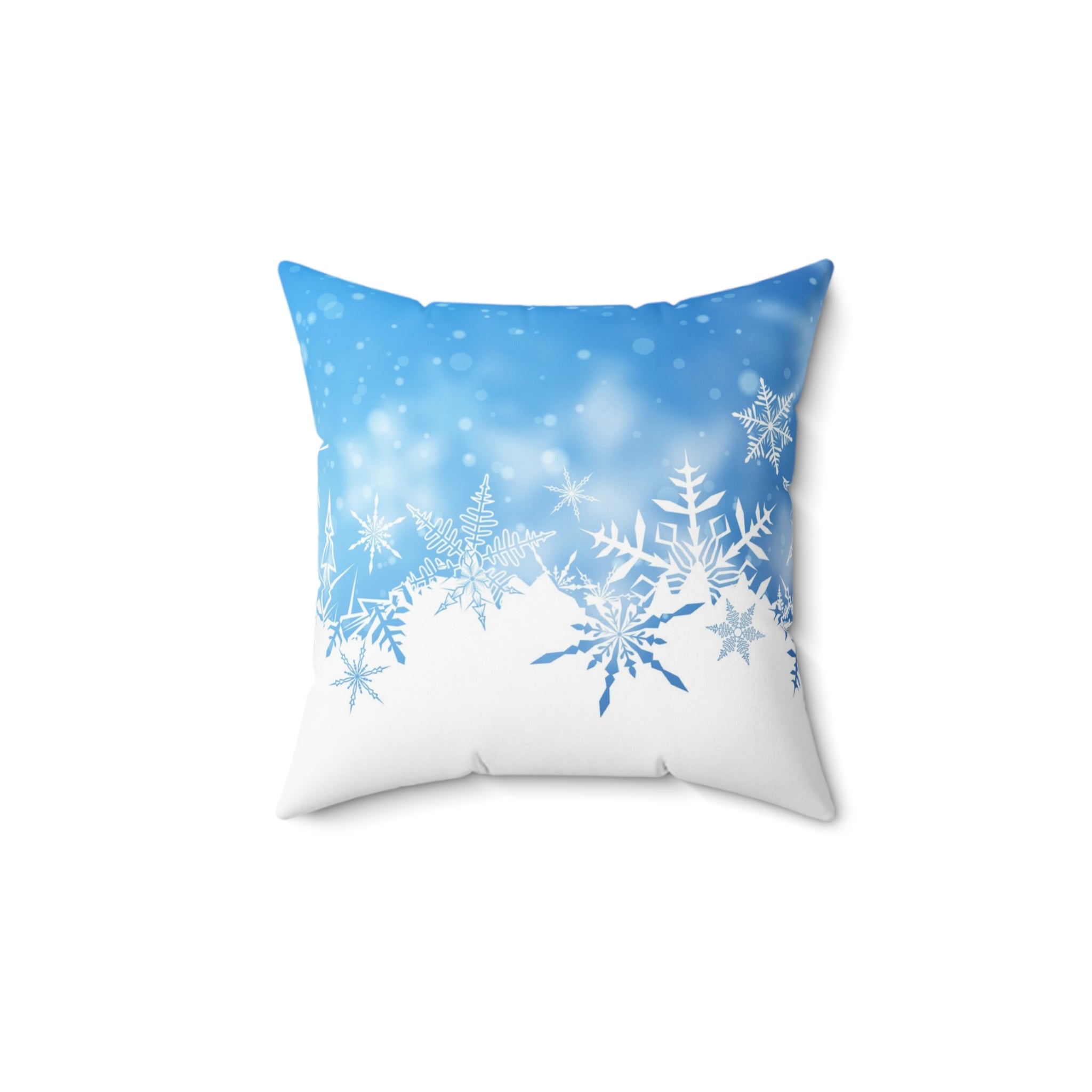 Decorative pillow with snowflake design on a blue and white background
