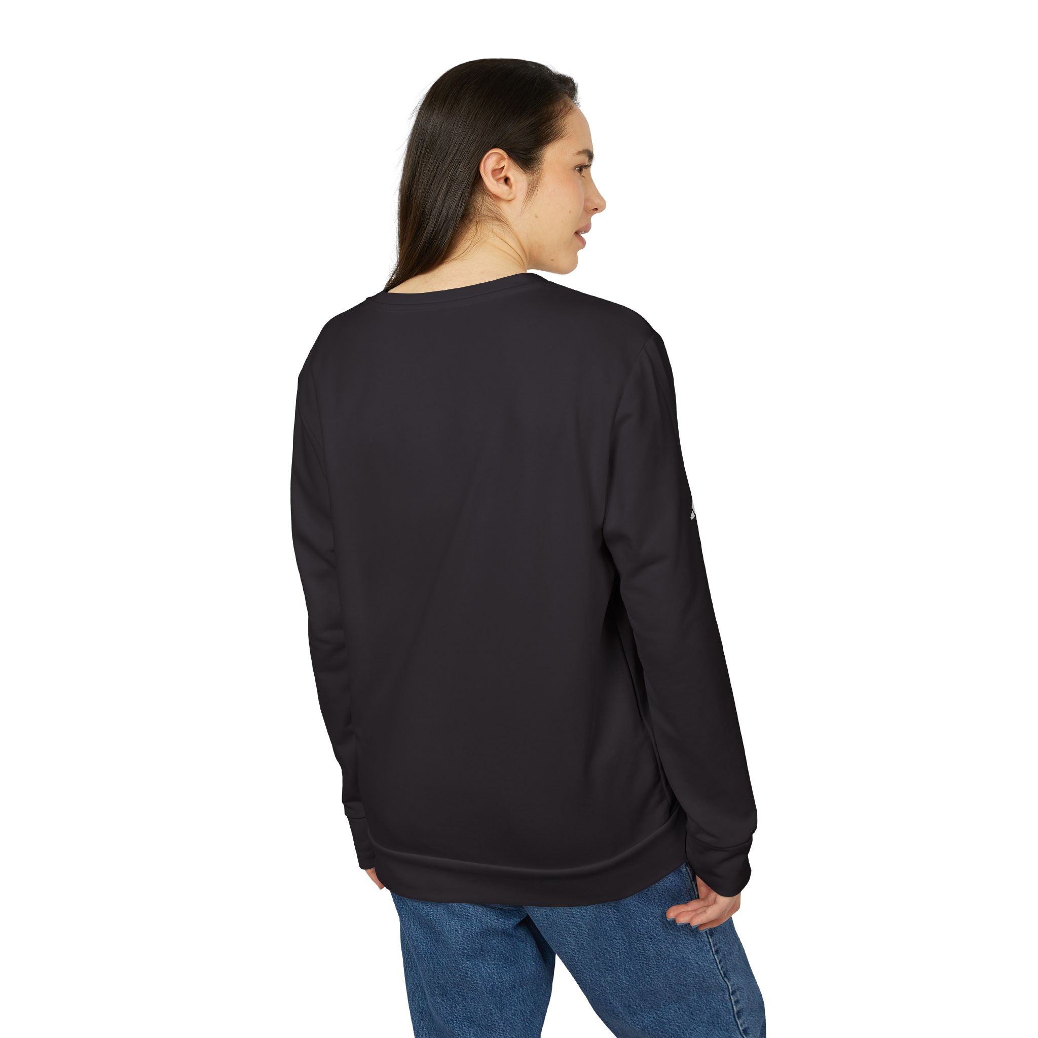 Person wearing a black sweatshirt and blue jeans on a white background