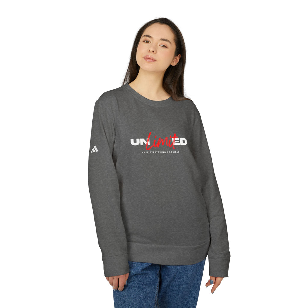 Person wearing a gray sweatshirt with Adidas logo and 'UNLTD' text on a white background