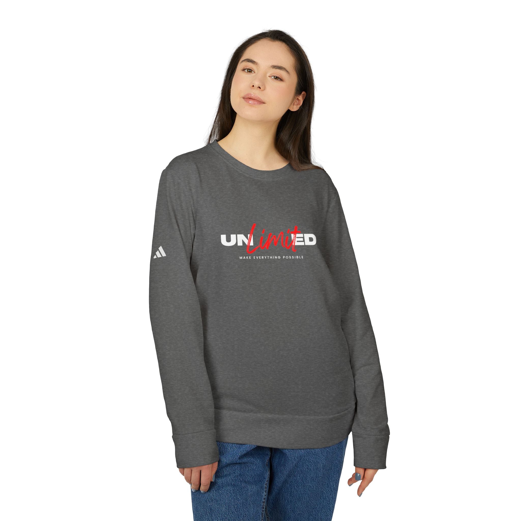 Person wearing a gray sweatshirt with Adidas logo and 'UNLTD' text on a white background