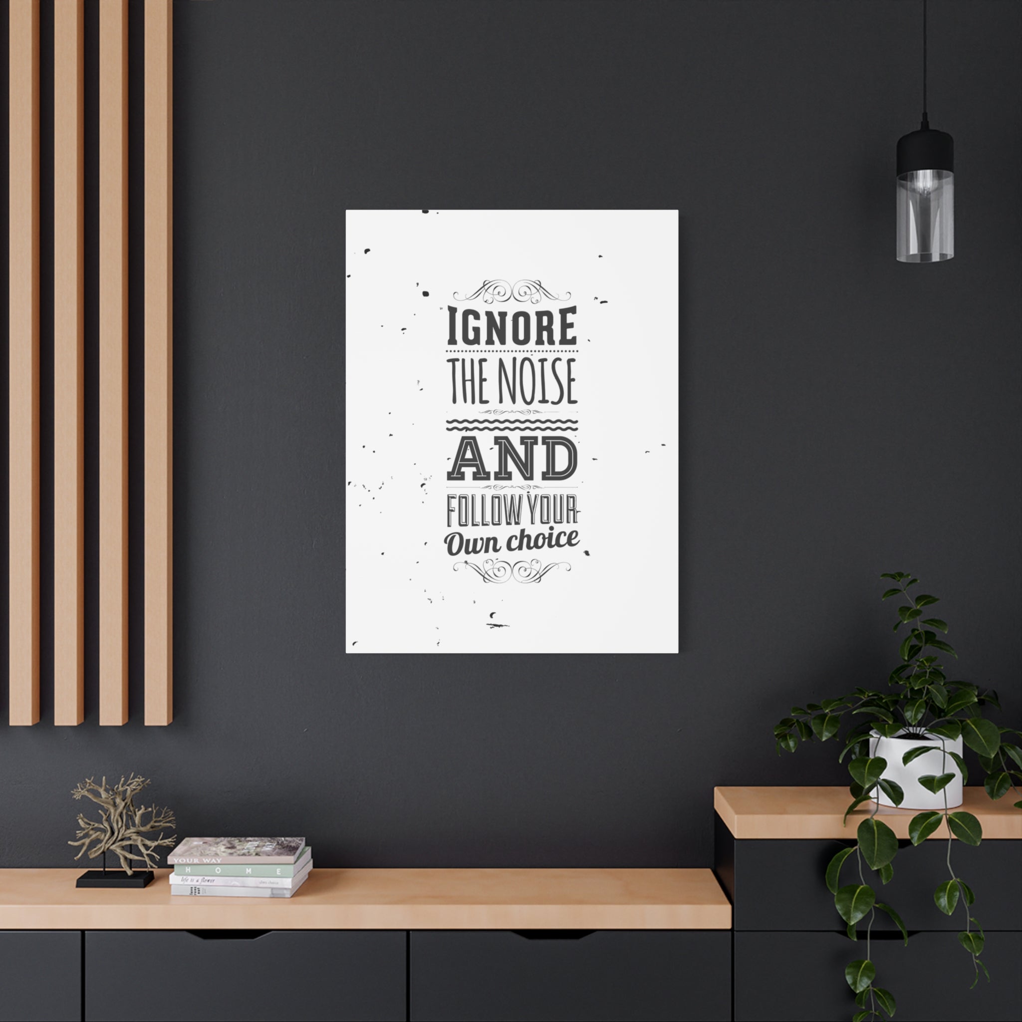 Poster with motivational quote on a dark wall in a modern interior setting