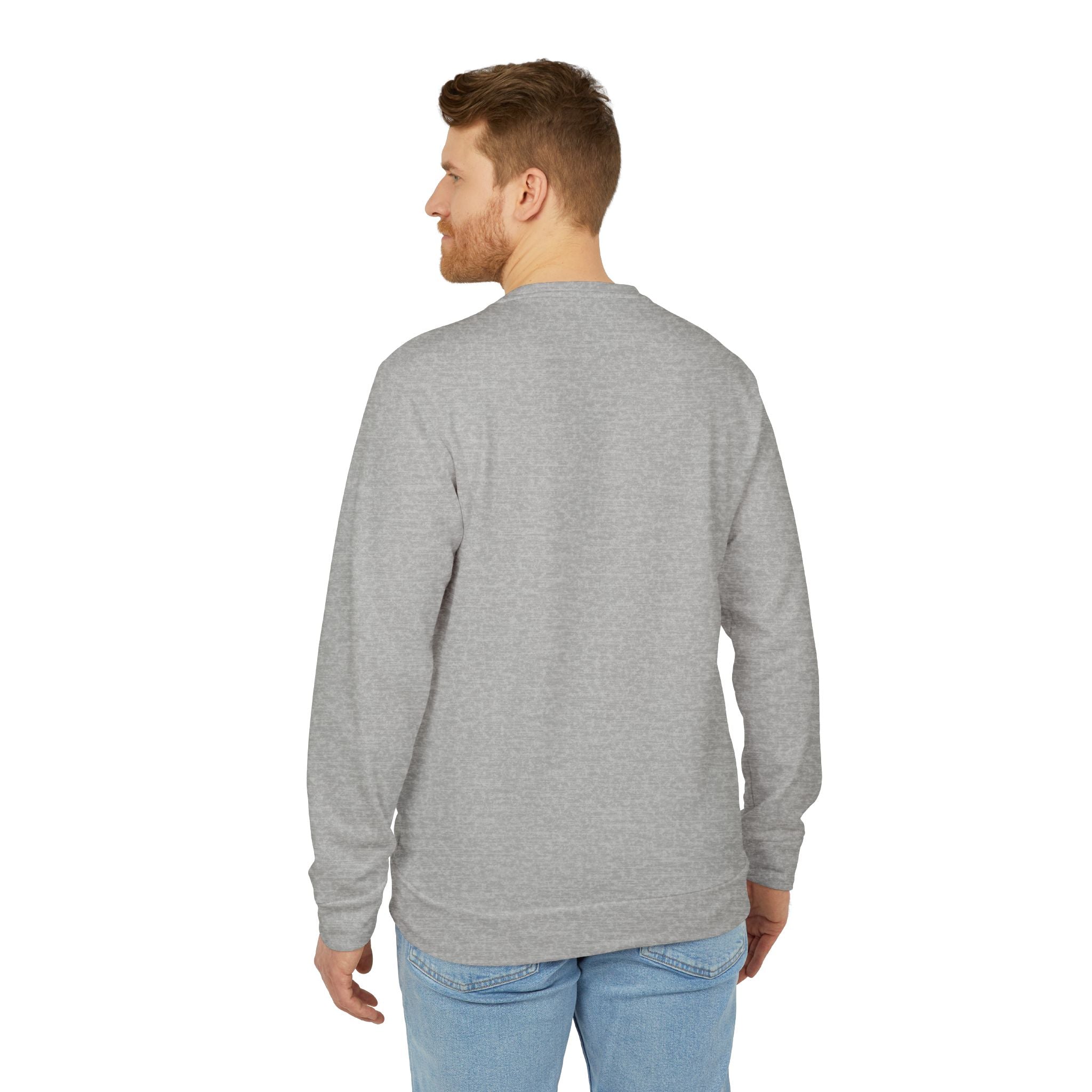 Man wearing a gray sweatshirt and light blue jeans on a white background