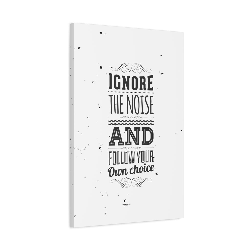 Canvas print with motivational quote 'Ignore the noise and follow your own choice' on a white background