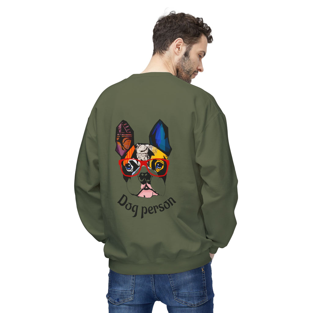 Person wearing a green sweatshirt with a colorful dog design and 'Dog person' text on the back.