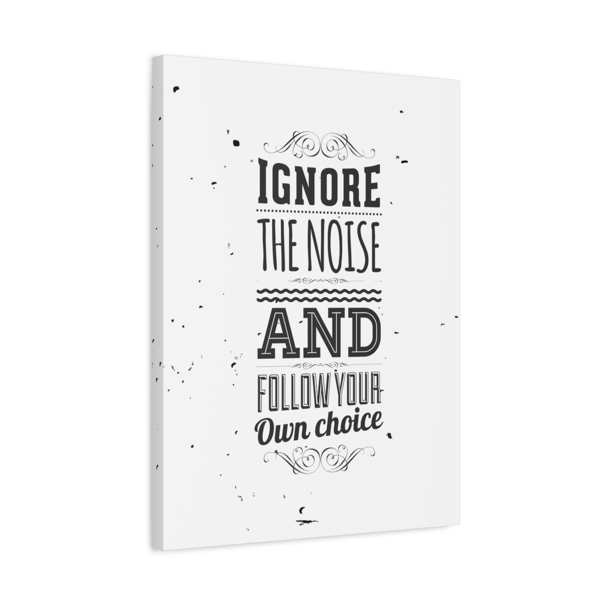 Canvas print with motivational quote 'Ignore the noise and follow your own choice' on a white background