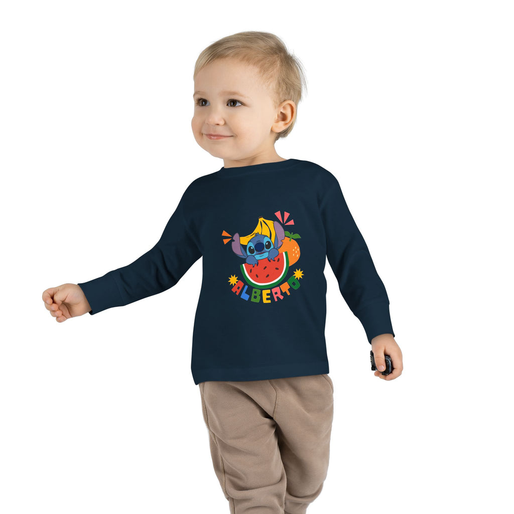 Child wearing a navy blue long-sleeve shirt with colorful graphics and text on a white background