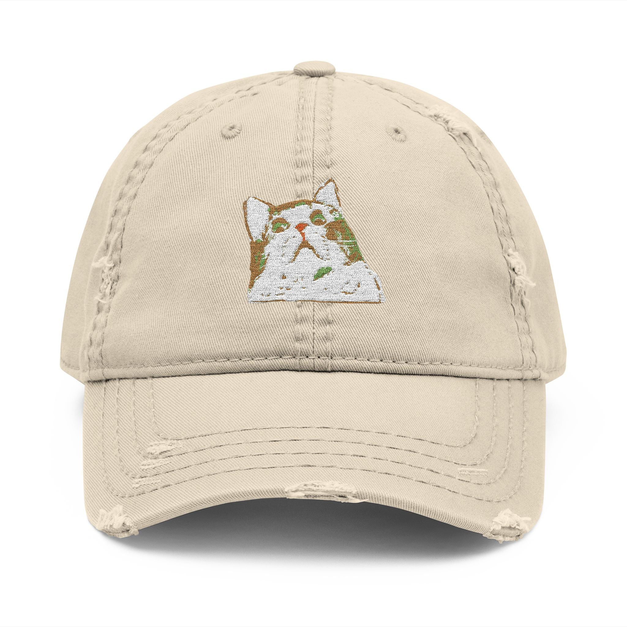 Beige cap with a small embroidered design on a white background