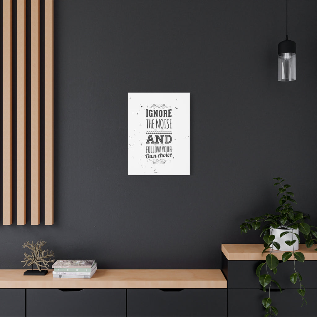 Poster with motivational quote on a dark wall in a modern interior setting