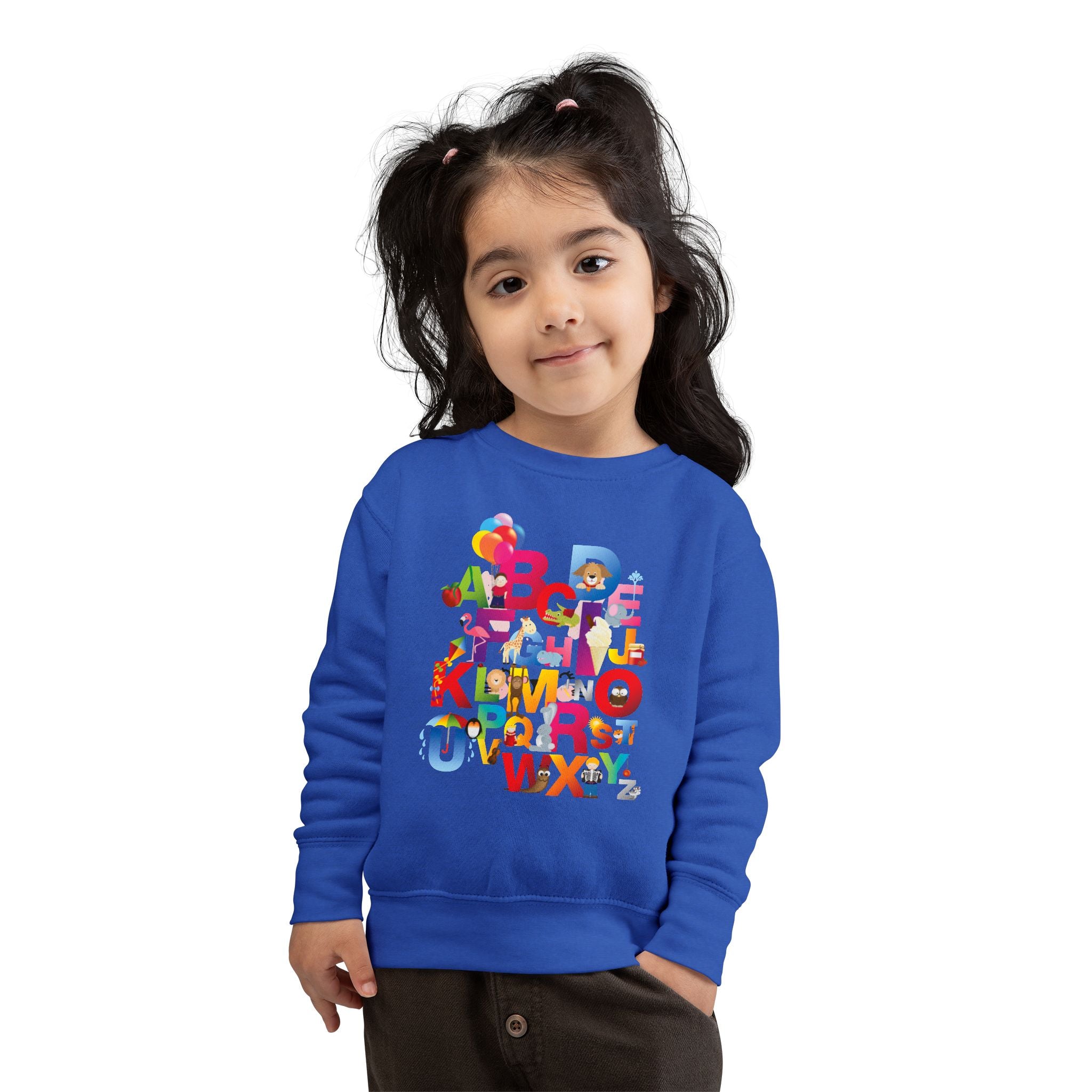 Child wearing a blue sweatshirt with colorful letters and graphics on a white background