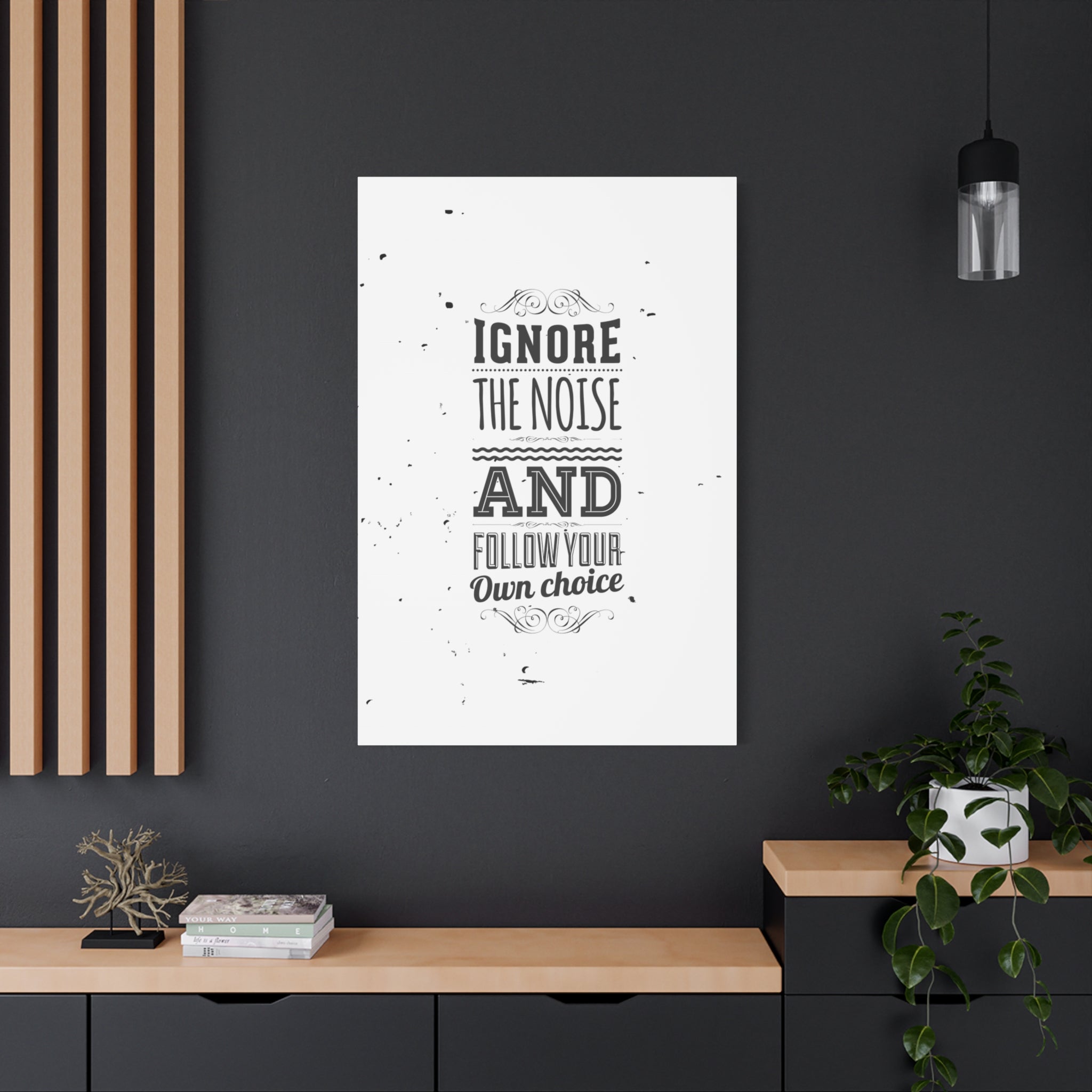 Poster with motivational quote on a dark wall in a modern interior setting
