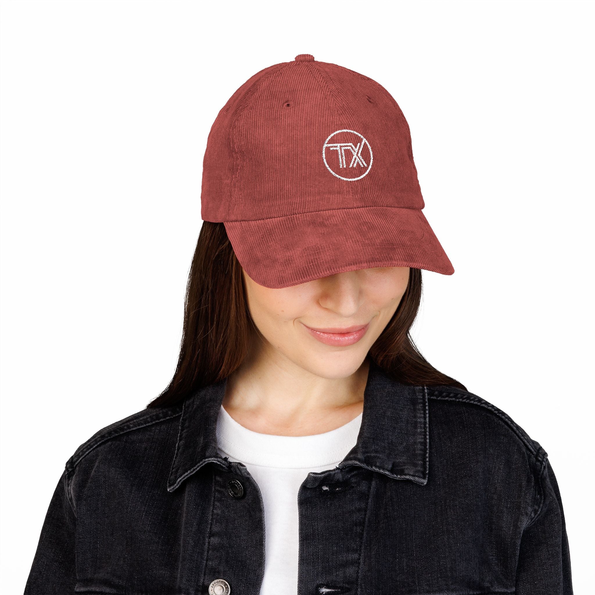 Person wearing a maroon cap with a logo on a white background