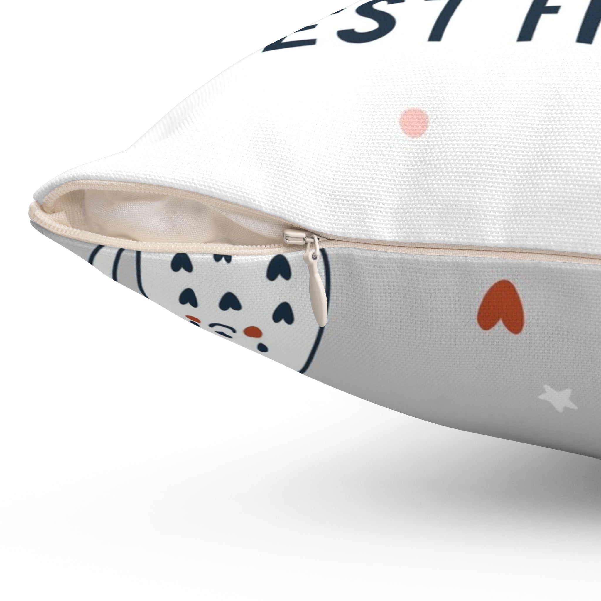 Close-up of a cushion with heart patterns on a white background