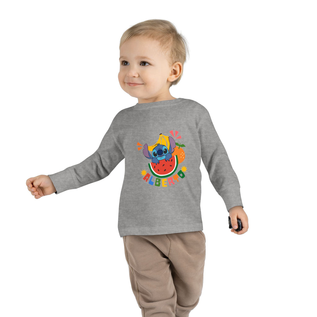 Child wearing a gray long-sleeve shirt with a colorful design on a white background