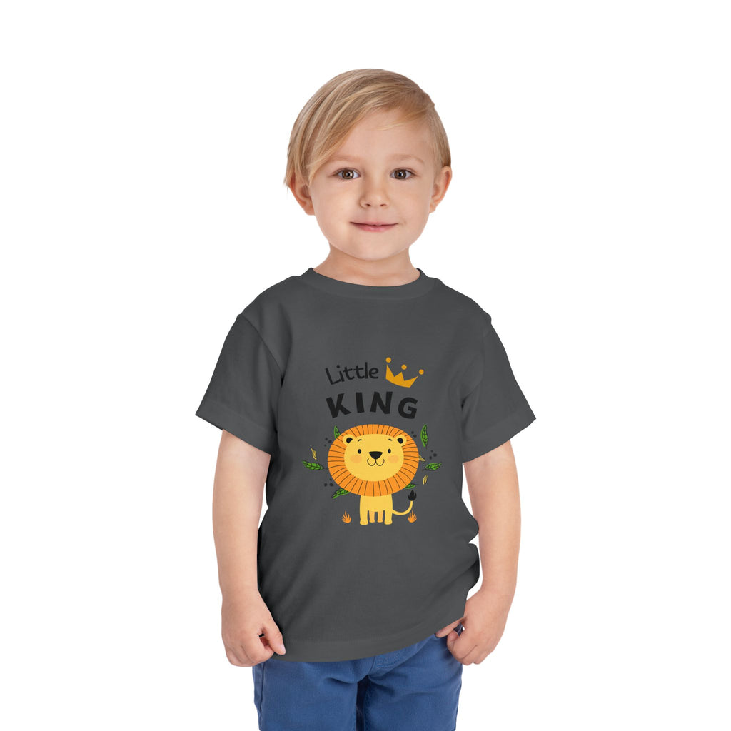 Child wearing a gray t-shirt with a lion graphic and 'Little King' text on a white background